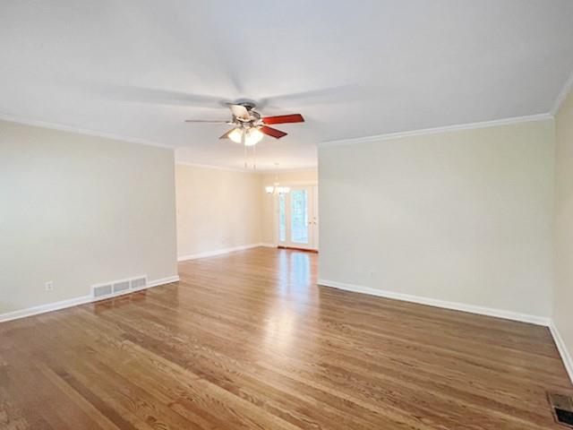 2711 Fairlane Drive Atlanta, GA 30340 - Photo 3 of 31 a view of an empty room with wooden floor