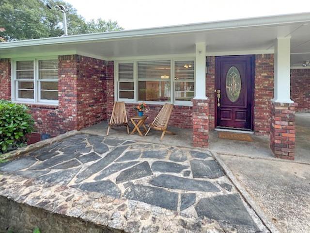 2711 Fairlane Drive Atlanta, GA 30340 - Photo 31 of 31 a front view of a house with a garden
