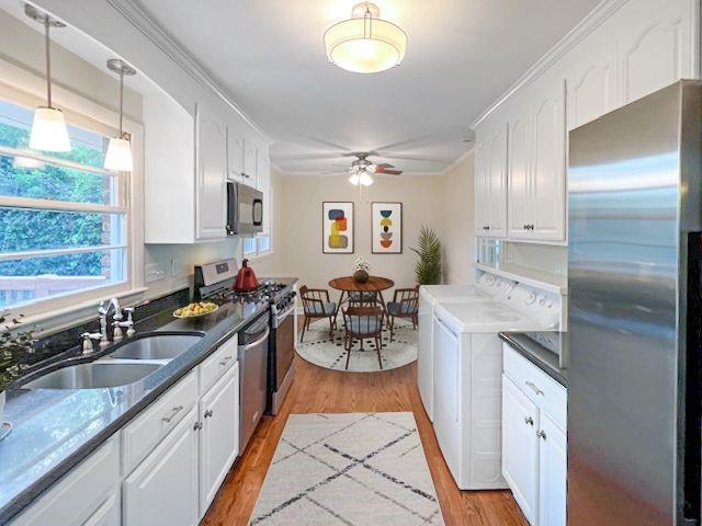2711 Fairlane Drive Atlanta, GA 30340 - Photo 8 of 31 a kitchen with a sink stove and cabinets