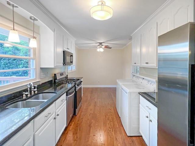 2711 Fairlane Drive Atlanta, GA 30340 - Photo 9 of 31 a kitchen with granite countertop a sink stove and refrigerator