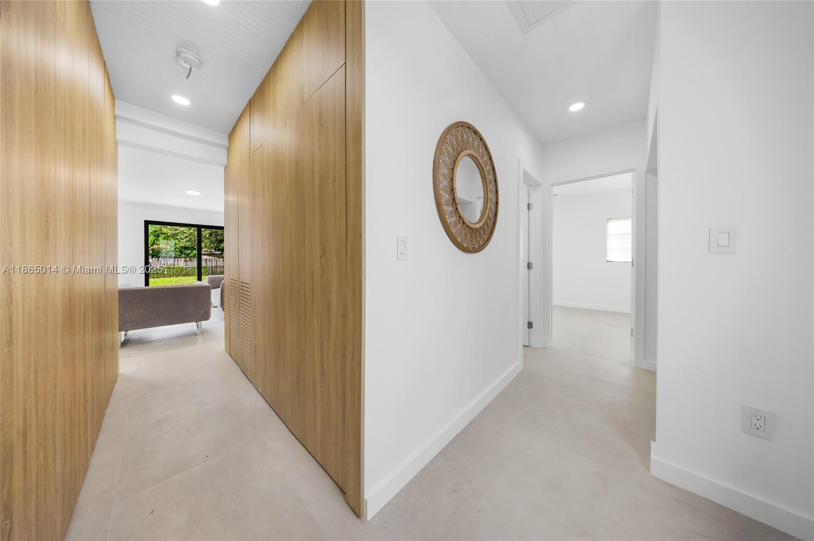 275 Northwest 97th Street Miami, FL 33150 - Photo 15 of 26 a view of a hallway with wooden floor
