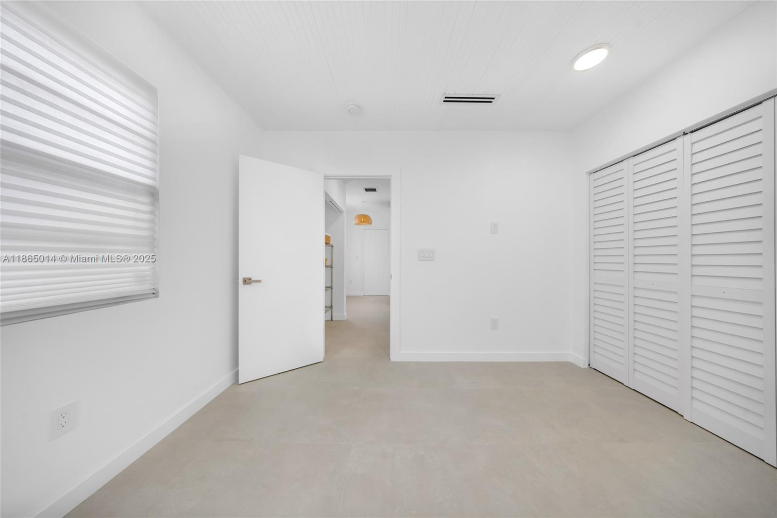 275 Northwest 97th Street Miami, FL 33150 - Photo 19 of 26 wooden floor in an empty room