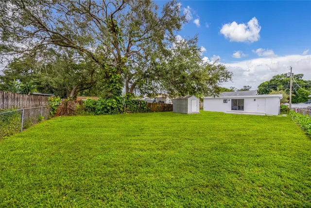 a house view with garden space