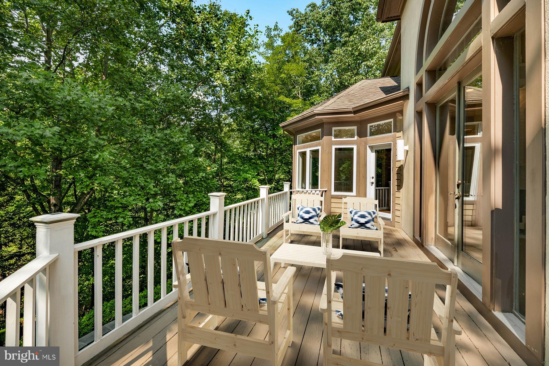 1202 Marinaview Drive Arnold, MD 21012 - Photo 3 of 26 a view of a patio with a table and chairs