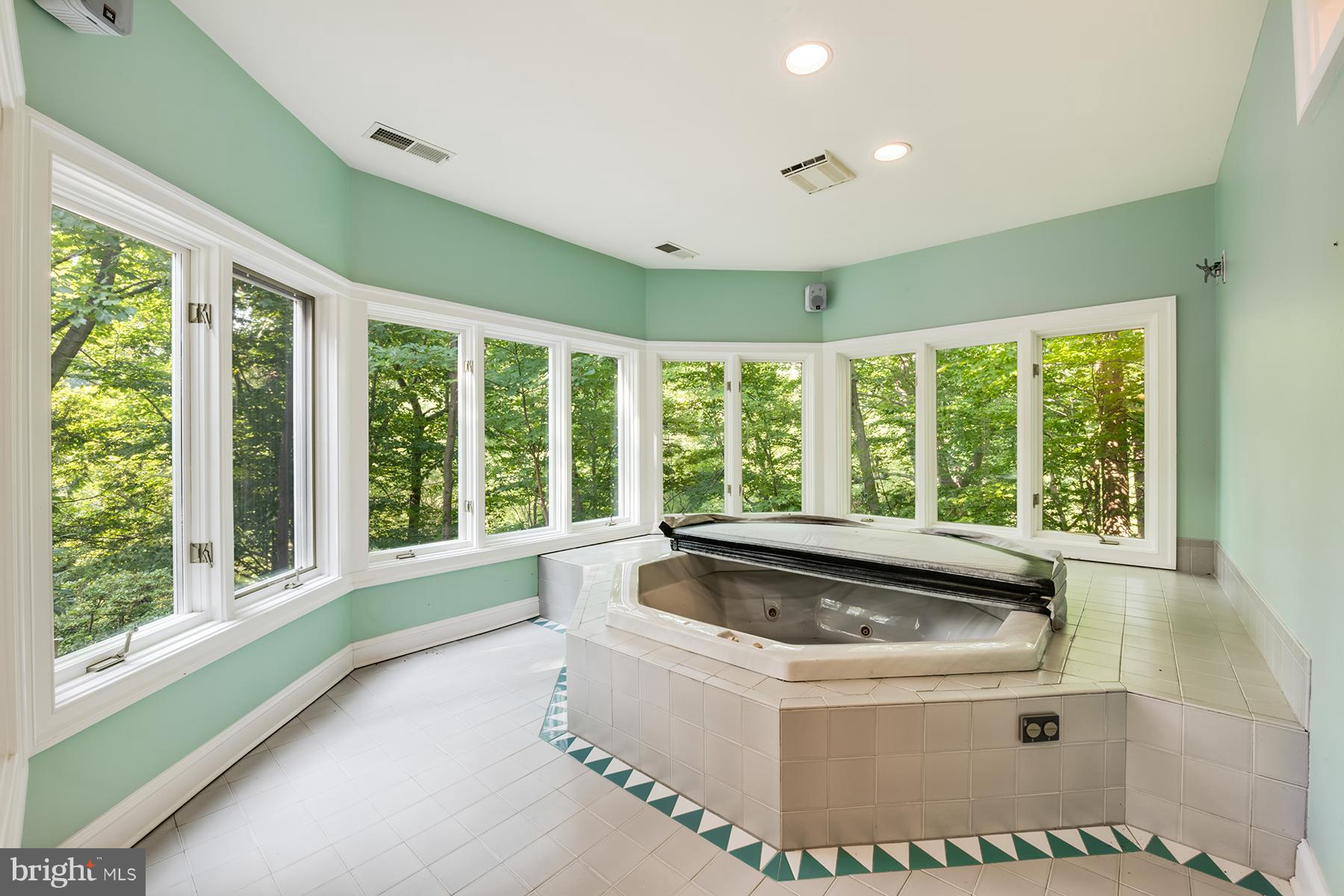 1202 Marinaview Drive Arnold, MD 21012 - Photo 22 of 26 a living room with a large window and a rug