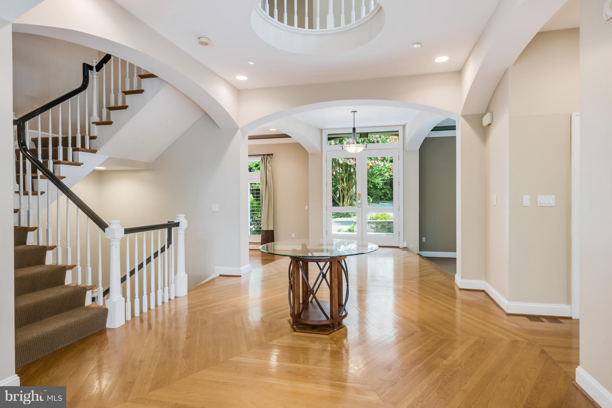 1202 Marinaview Drive Arnold, MD 21012 - Photo 4 of 26 a room with lots of wooden furniture and windows