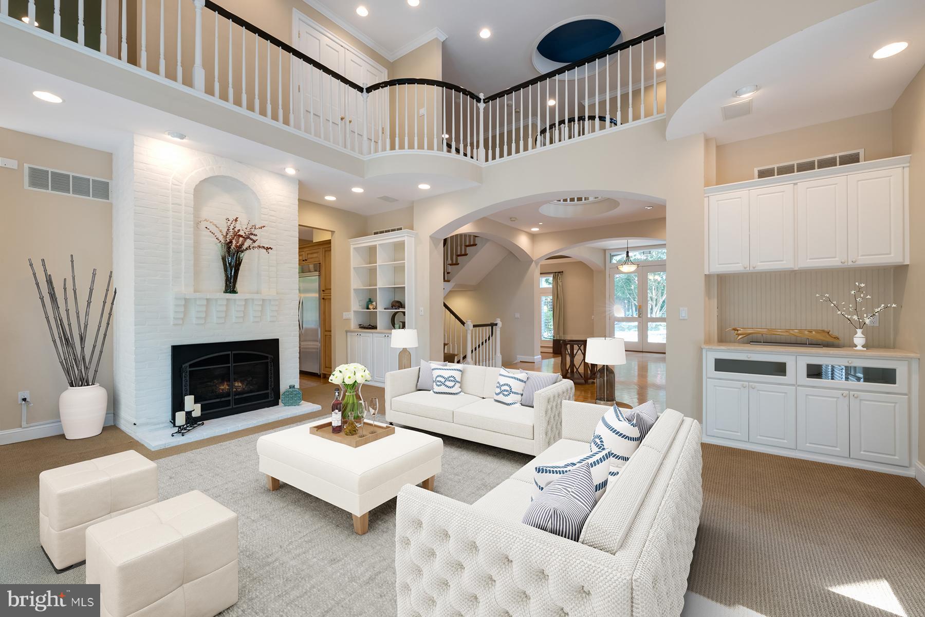 1202 Marinaview Drive Arnold, MD 21012 - Photo 5 of 26 a living room with furniture and a fireplace