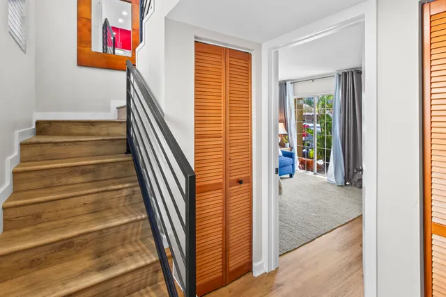 a close up view of a kitchen with washer and dryer