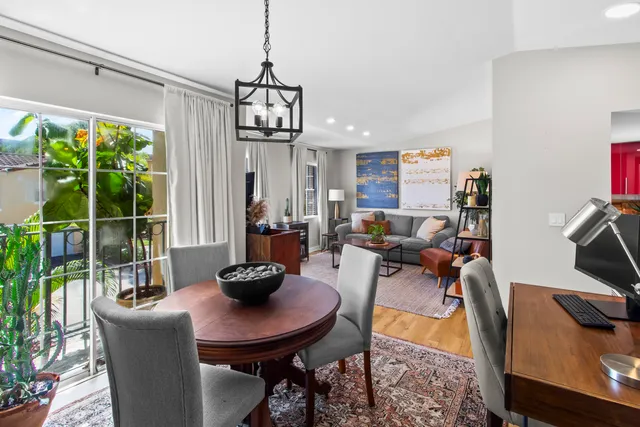 a view of a dining room with furniture window and outside view
