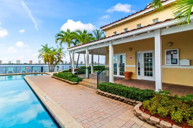 a view of a yard with palm trees