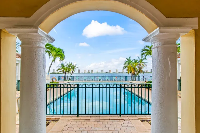 a view of swimming pool with outdoor seating and yard