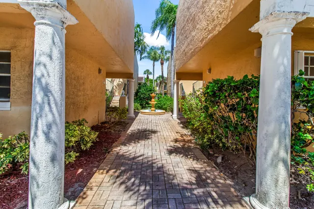 a potted plant on a brick building