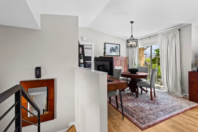 a view of a livingroom with furniture and window