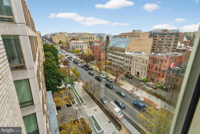 a view of a city with tall buildings