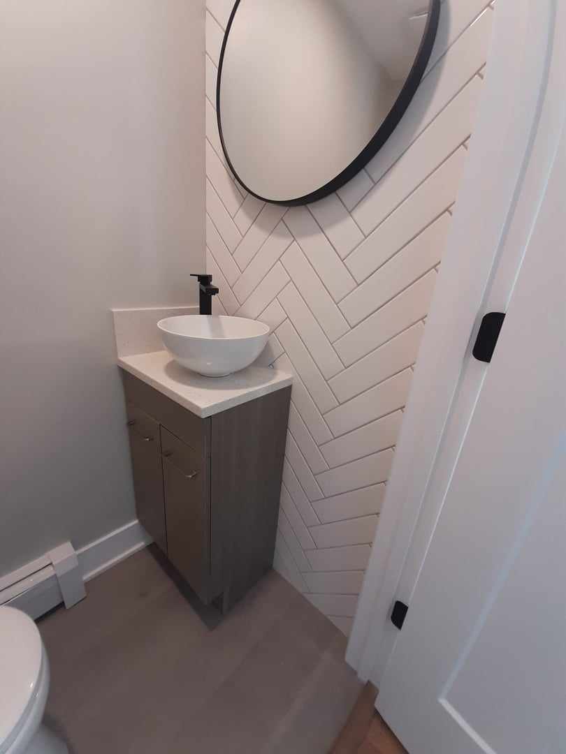 9421 South Roberts Road, Unit 1NW Hickory Hills, IL 60457 - Photo 10 of 12 a bathroom with a sink and mirror