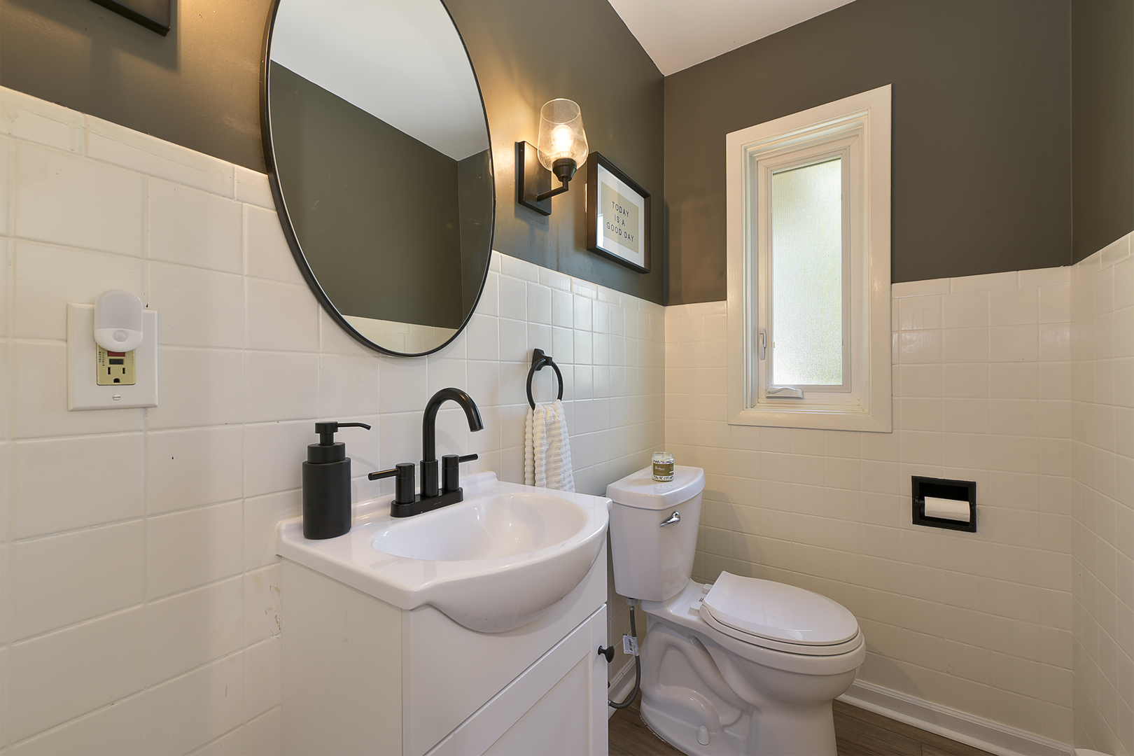 256 Sharon Drive Barrington, IL 60010 - Photo 11 of 23 a bathroom with a toilet sink and mirror