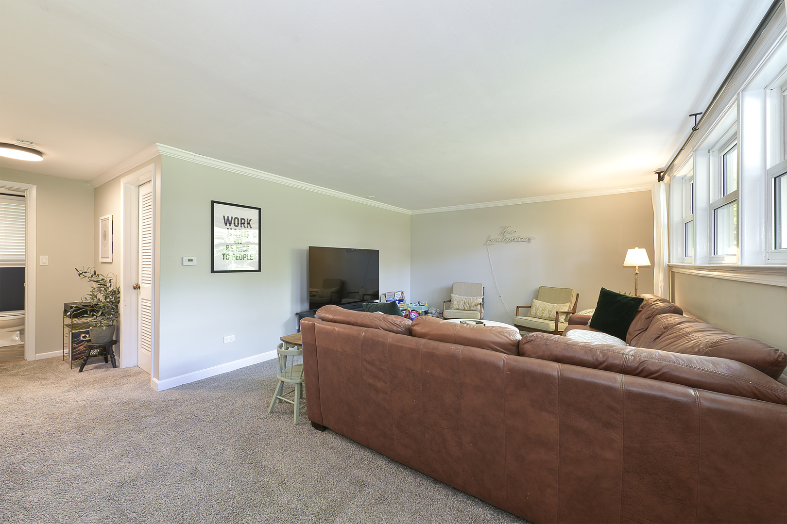 256 Sharon Drive Barrington, IL 60010 - Photo 14 of 23 a living room with furniture and a flat screen tv