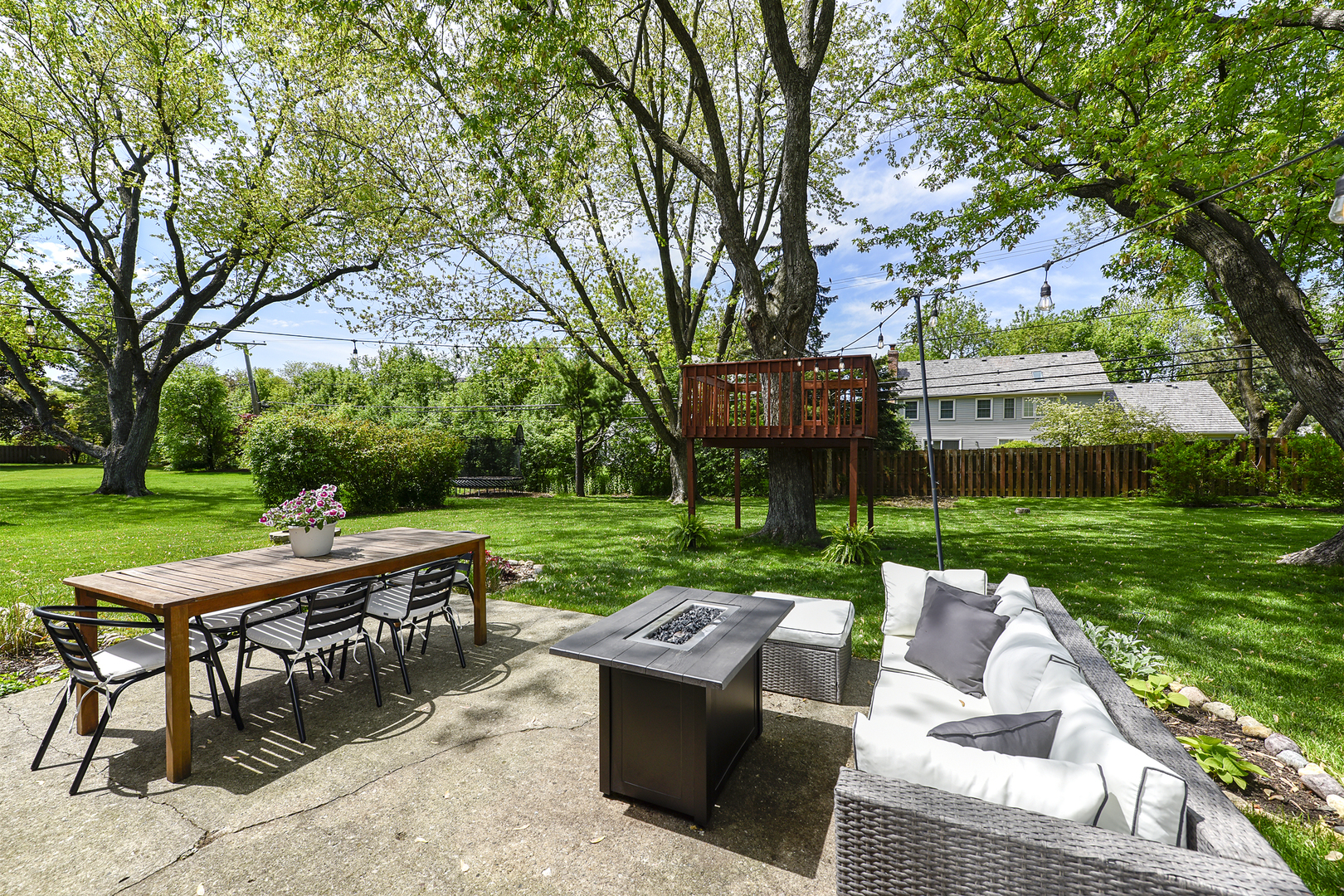 256 Sharon Drive Barrington, IL 60010 - Photo 19 of 23 a view of a patio with couches and table and chairs with a yard