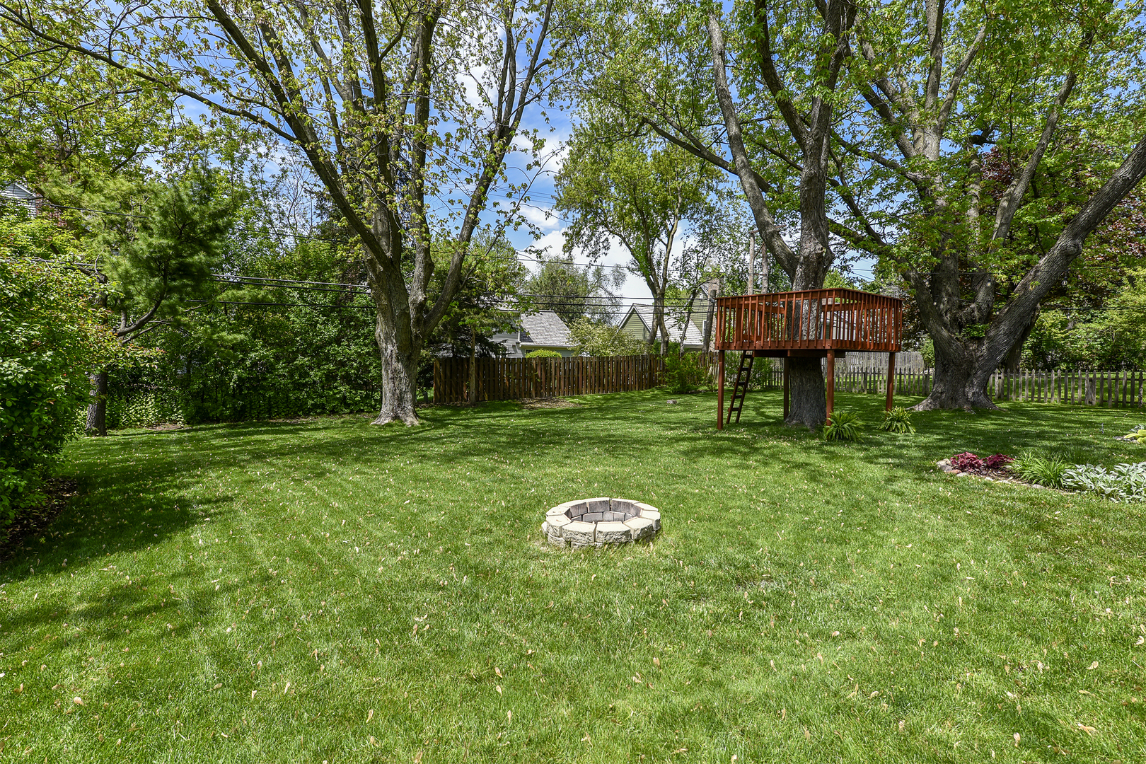 256 Sharon Drive Barrington, IL 60010 - Photo 21 of 23 a view of a table and chairs in the garden