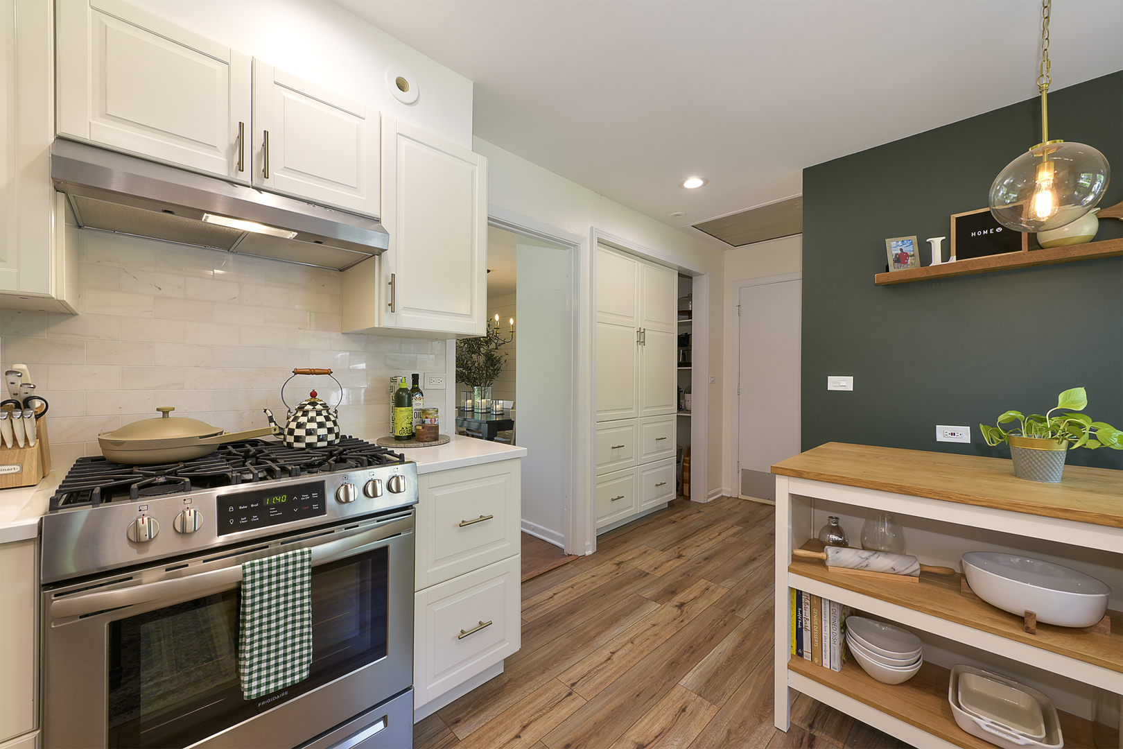256 Sharon Drive Barrington, IL 60010 - Photo 10 of 23 a kitchen with stainless steel appliances granite countertop a stove a microwave and cabinets