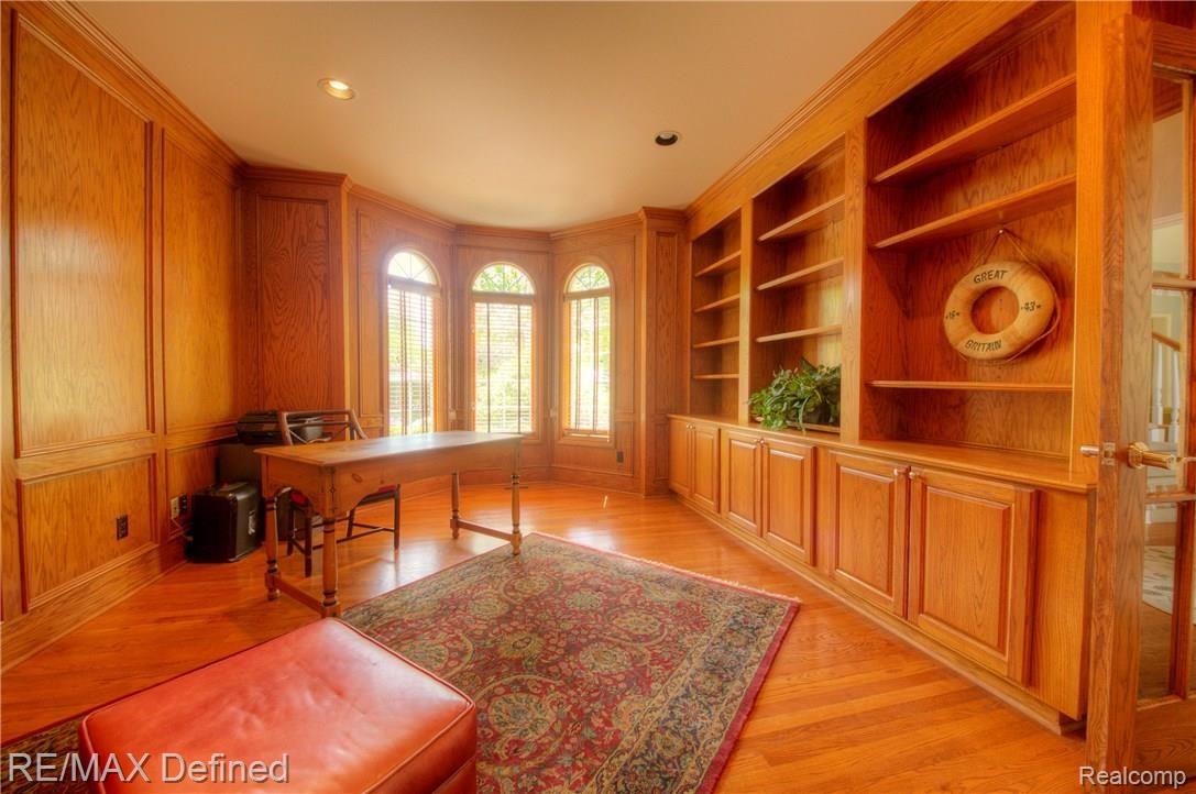 3505 Moceri Court Rochester, MI 48306 - Photo 27 of 64 Oak Paneled library with built-ins