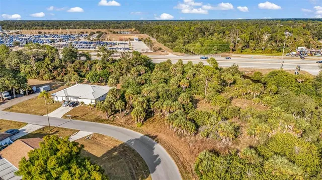 a view of a swimming pool with an outdoor seating