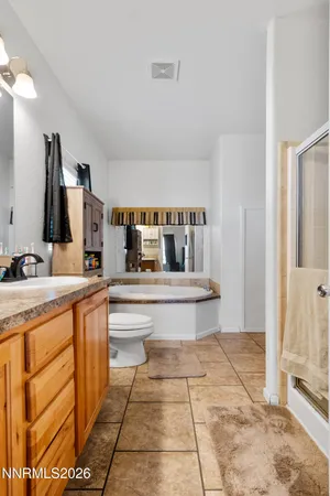 a view of living room with granite countertop furniture and a fireplace