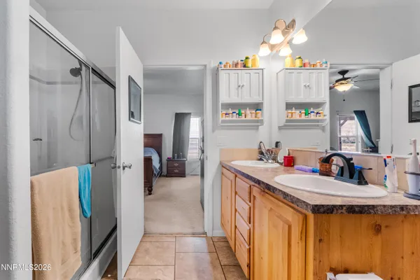 a kitchen that has a sink a refrigerator and a sink