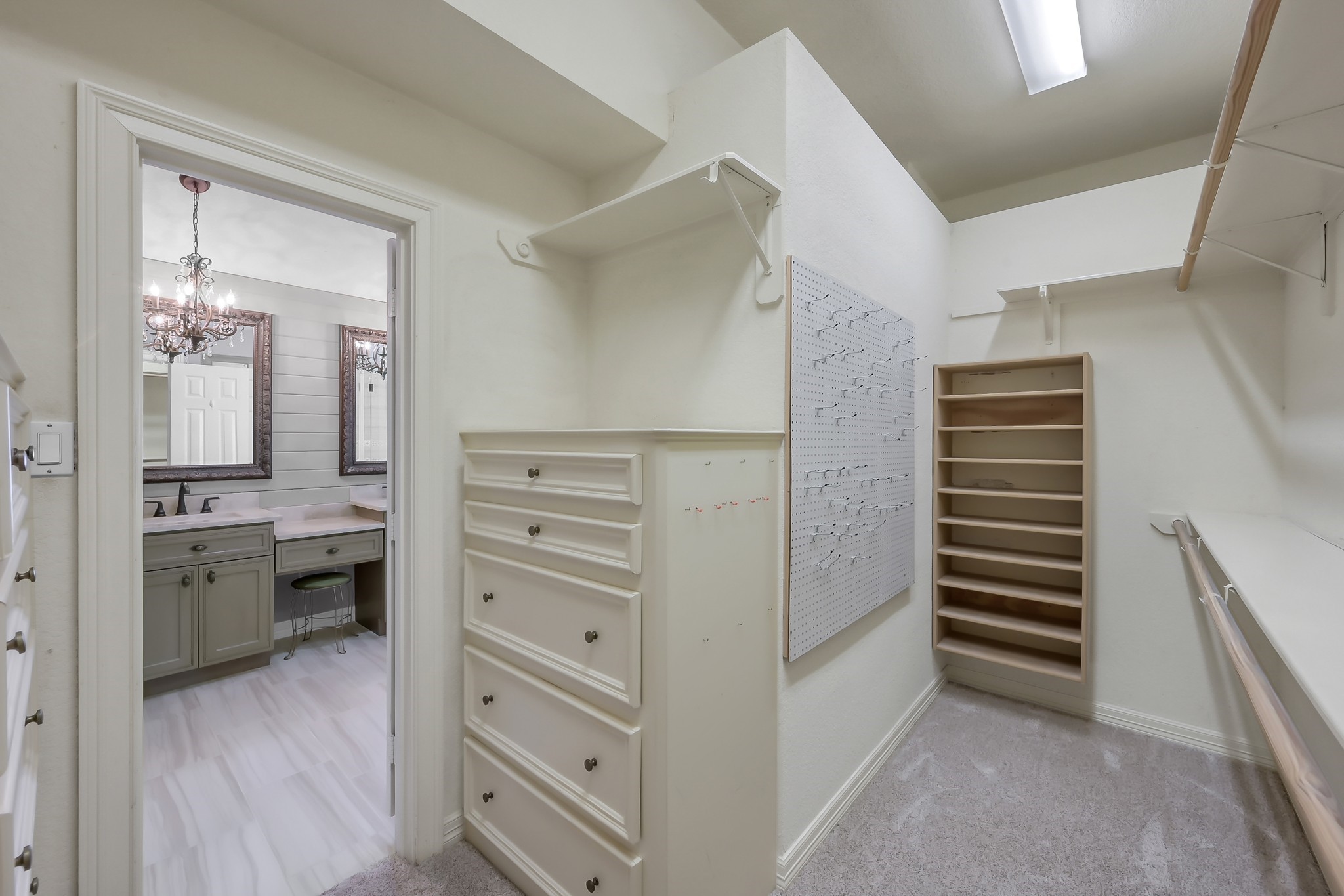 25536 Richards Road Spring, TX 77386 - Photo 27 of 44 Primary Walk in Closet with built-in shelving, plenty of storage space!