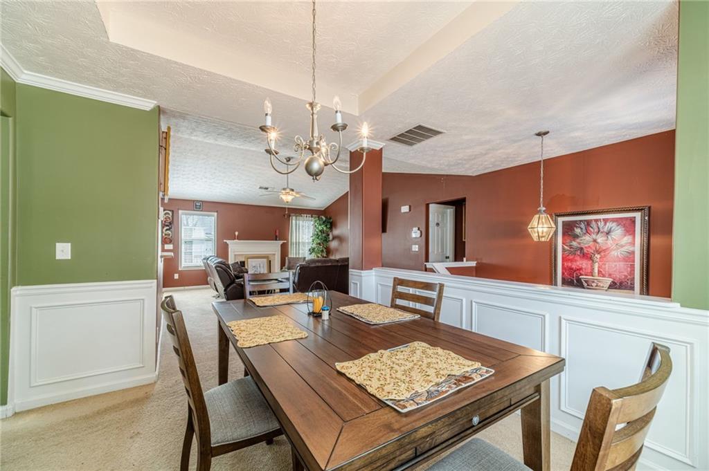 1185 Wendy Way Winder, GA 30680 - Photo 12 of 43 a view of a dining room with furniture