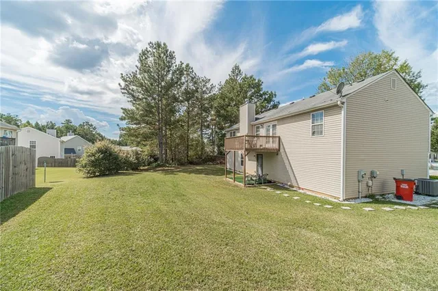 a view of a backyard with cabin