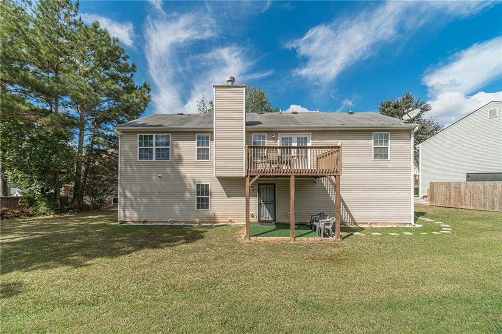 1185 Wendy Way Winder, GA 30680 - Photo 41 of 43 a view of a house with backyard and garden