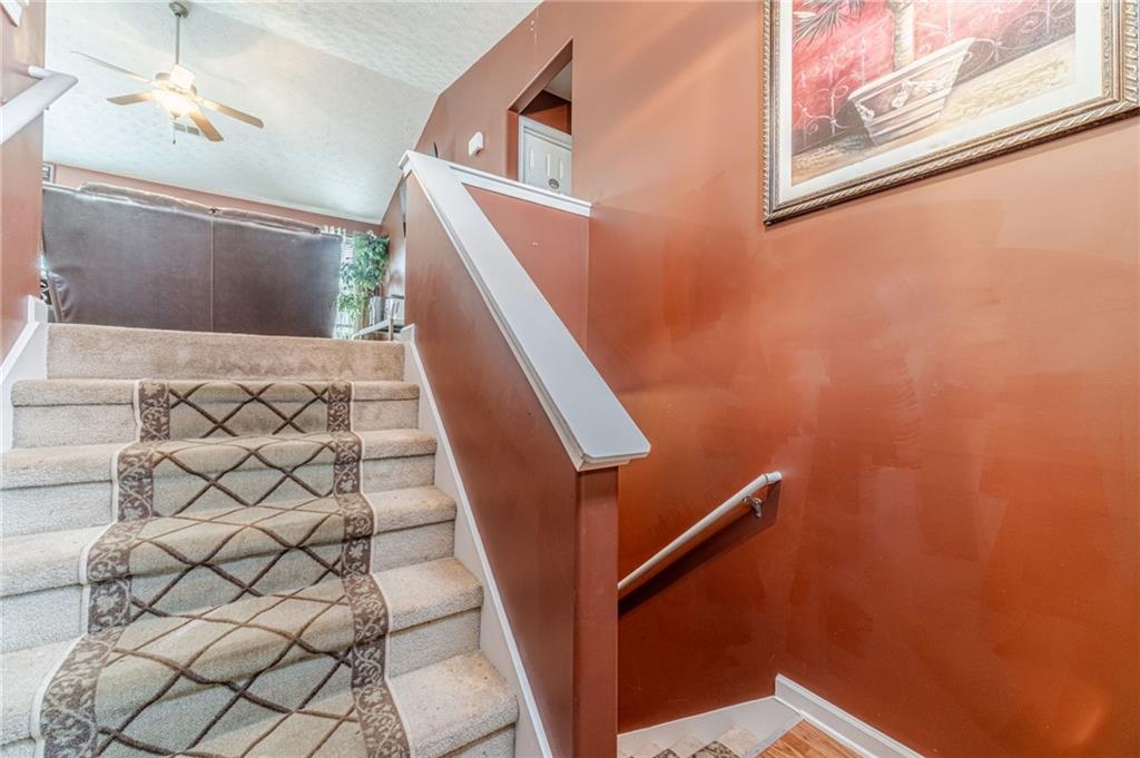 1185 Wendy Way Winder, GA 30680 - Photo 6 of 43 a view of wooden staircase