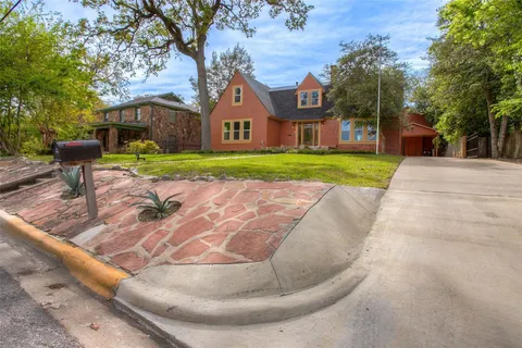 a view of a house with entertaining space