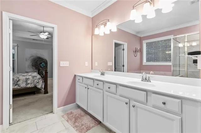 a bathroom with a tub and a shower