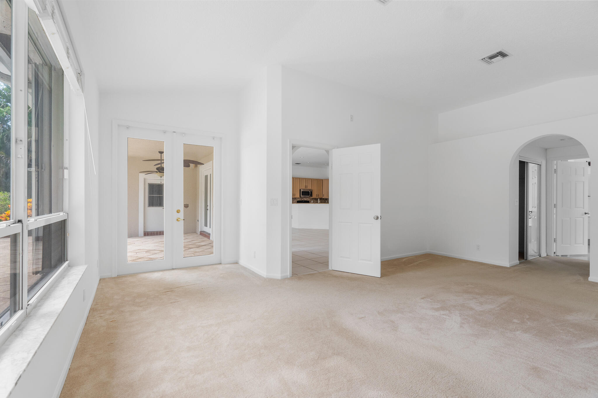 12253 Rockledge Circle Boca Raton, FL 33428 - Photo 19 of 36 an empty room with windows