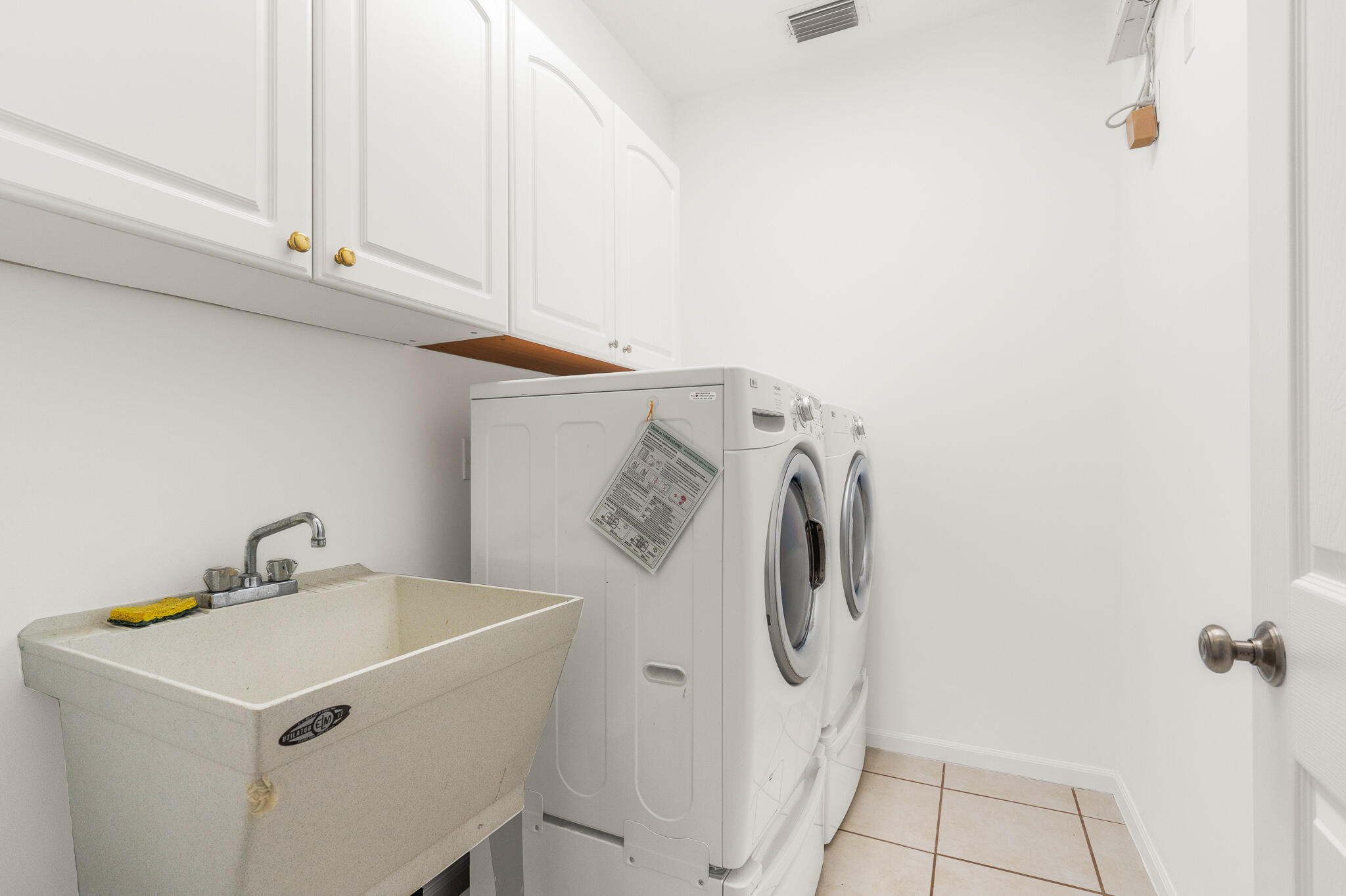 12253 Rockledge Circle Boca Raton, FL 33428 - Photo 30 of 36 a utility room with dryer and washer