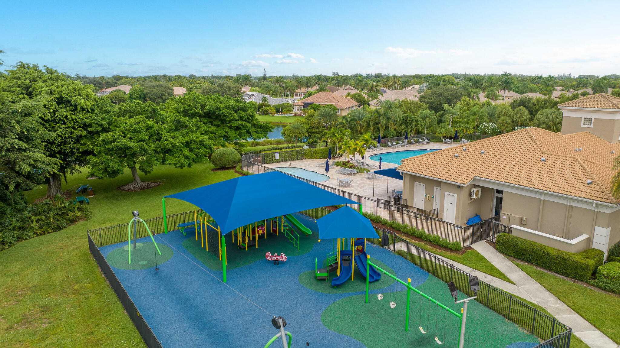 12253 Rockledge Circle Boca Raton, FL 33428 - Photo 34 of 36 an aerial view of residential houses with outdoor space and trees