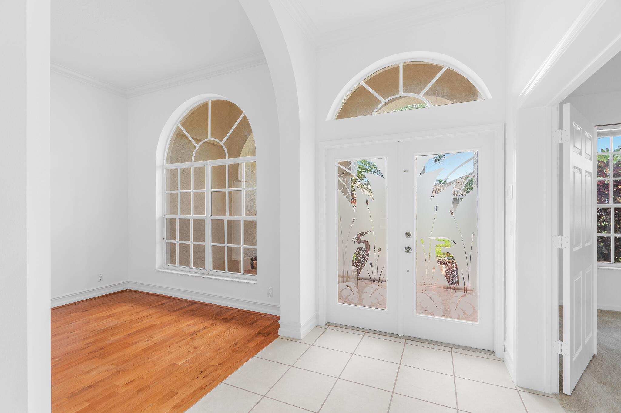 12253 Rockledge Circle Boca Raton, FL 33428 - Photo 8 of 36 an empty room with windows