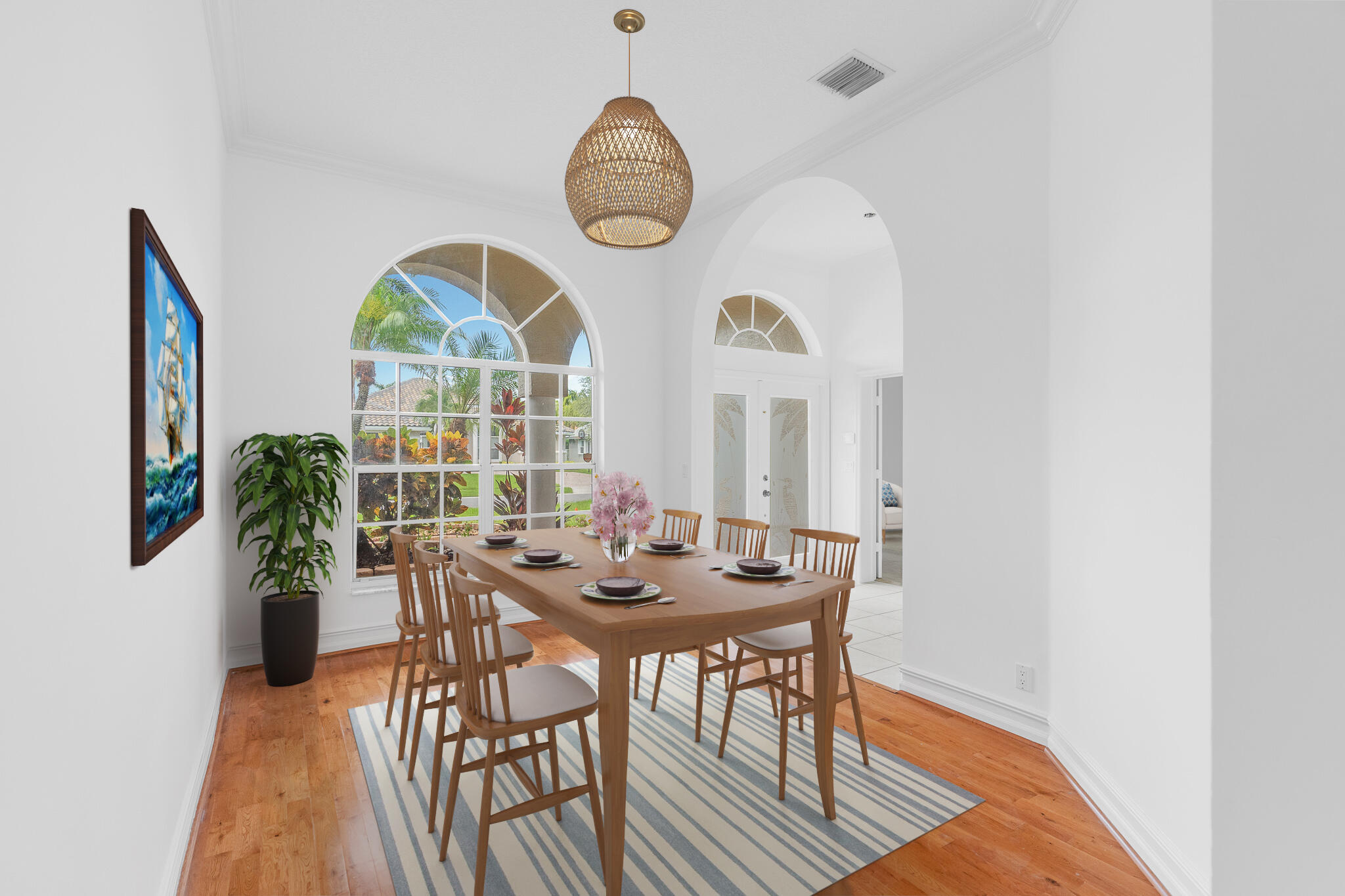 12253 Rockledge Circle Boca Raton, FL 33428 - Photo 9 of 36 a view of a dining room with furniture and a large window
