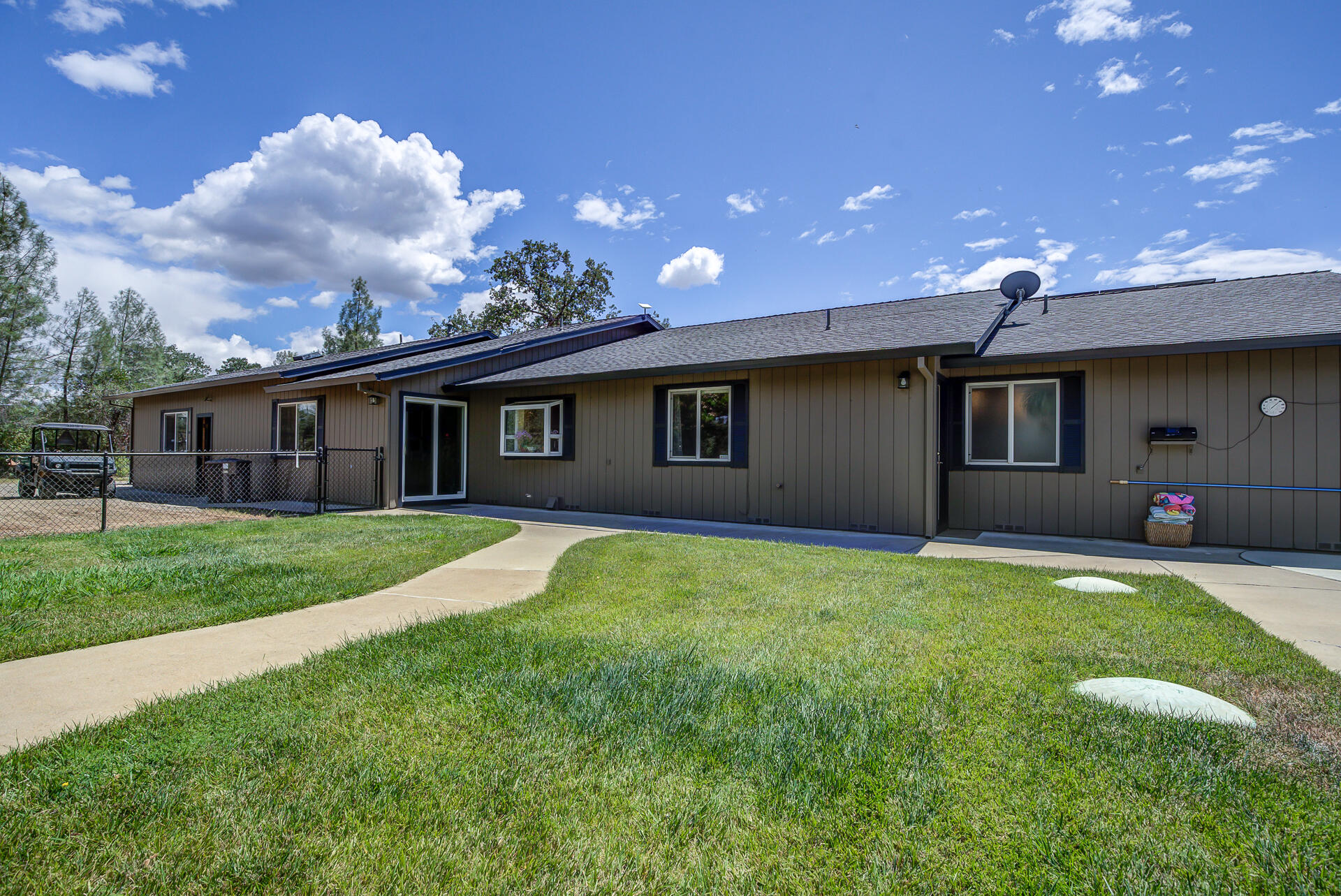 17536 Oly Way Anderson, CA 96007 - Photo 33 of 51 a backyard of a house with table and chairs