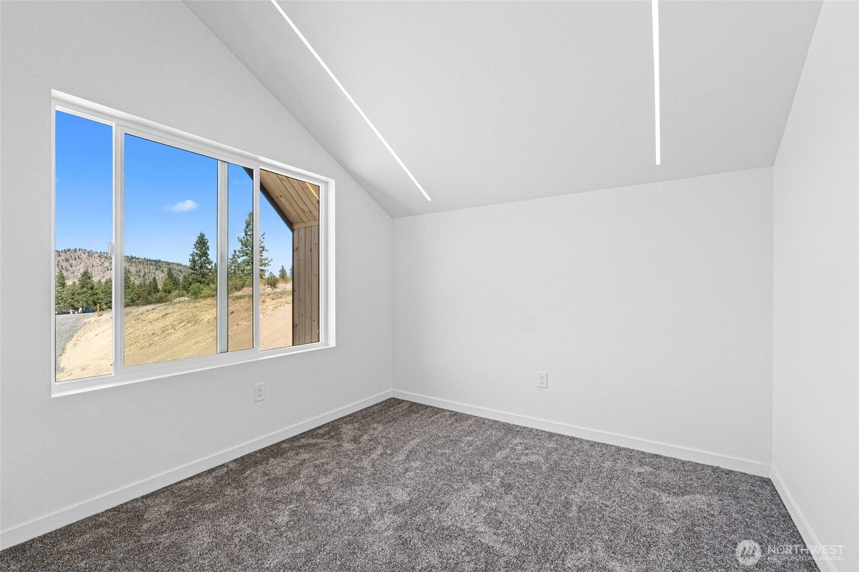 38265 Timber Lane North Lincoln, WA 99147 - Photo 21 of 37 an empty room with a window