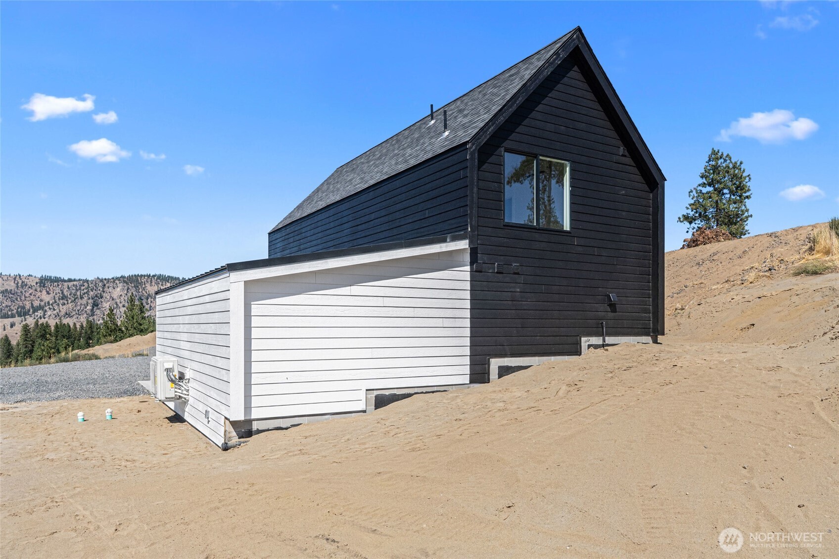 38265 Timber Lane North Lincoln, WA 99147 - Photo 26 of 37 a view of a house with a yard
