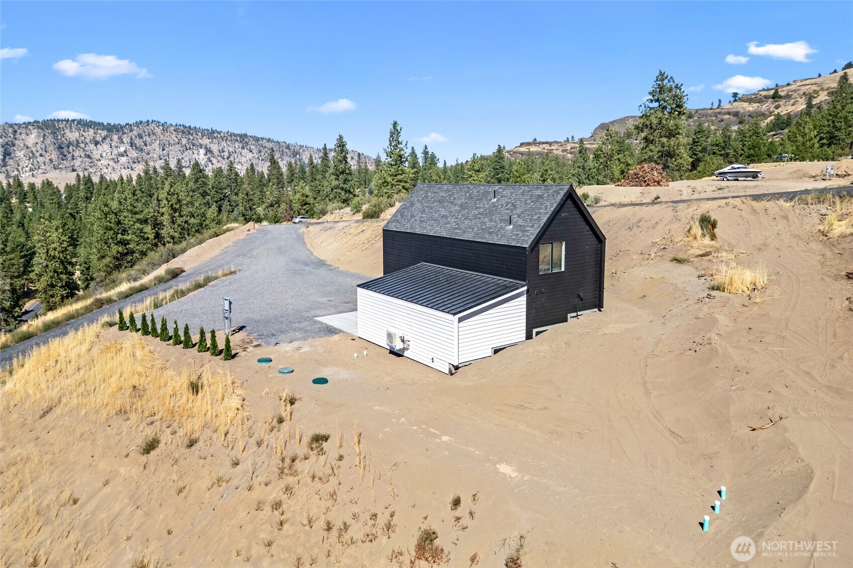 38265 Timber Lane North Lincoln, WA 99147 - Photo 30 of 37 a view of a backyard of a house
