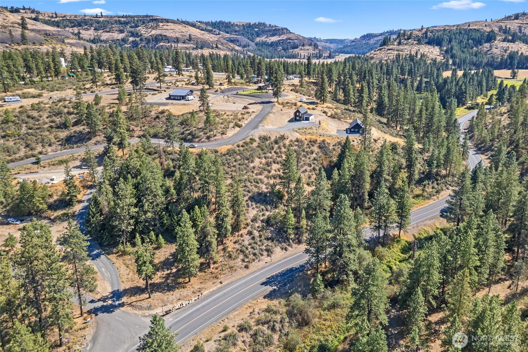 38265 Timber Lane North Lincoln, WA 99147 - Photo 36 of 37 a view of a lake with a mountain
