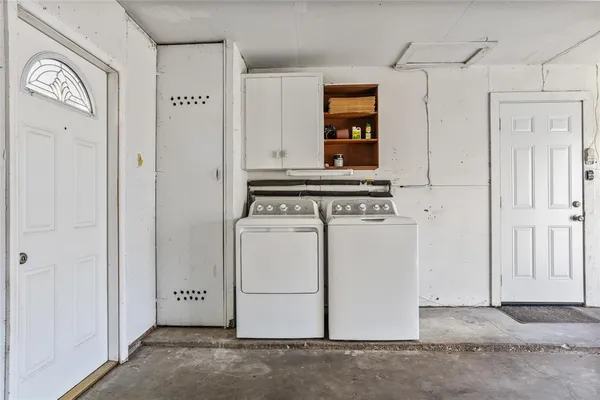 a view of a storage and utility room