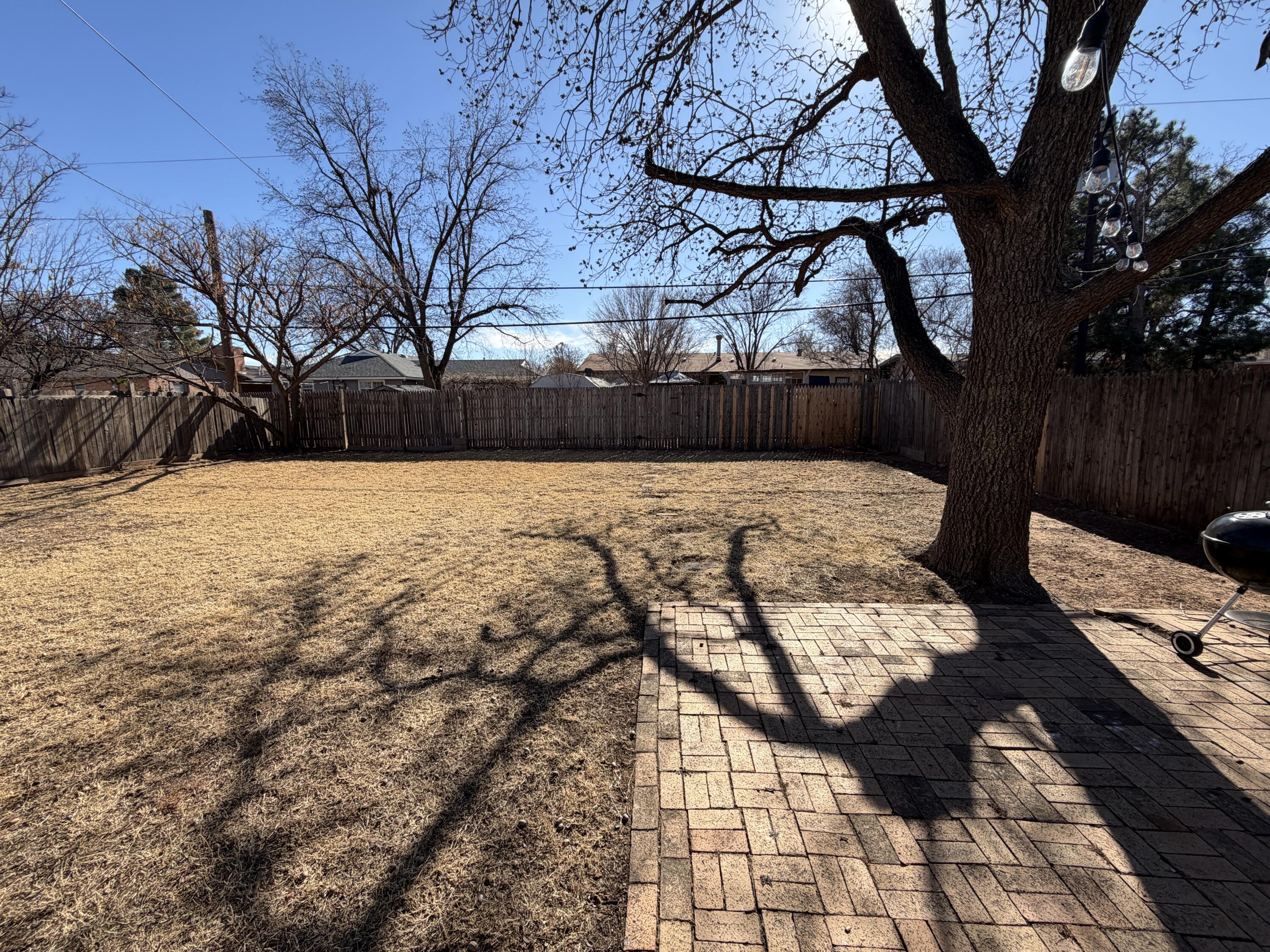 3113 38th Street Lubbock, TX 79413 - Photo 21 of 22 a view of a backyard of the house