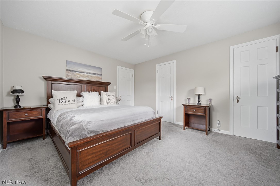 2231 Brockway Road University Heights, OH 44118 - Photo 22 of 46 Spacious room featuring light gray carpeting, neutral wall color, and a ceiling fan with light fixture