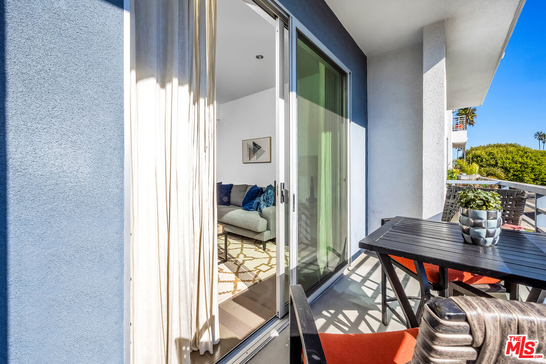 7857 West Manchester Avenue, Unit 201 Playa del Rey, CA 90293 - Photo 10 of 28 a view of a balcony and dining area