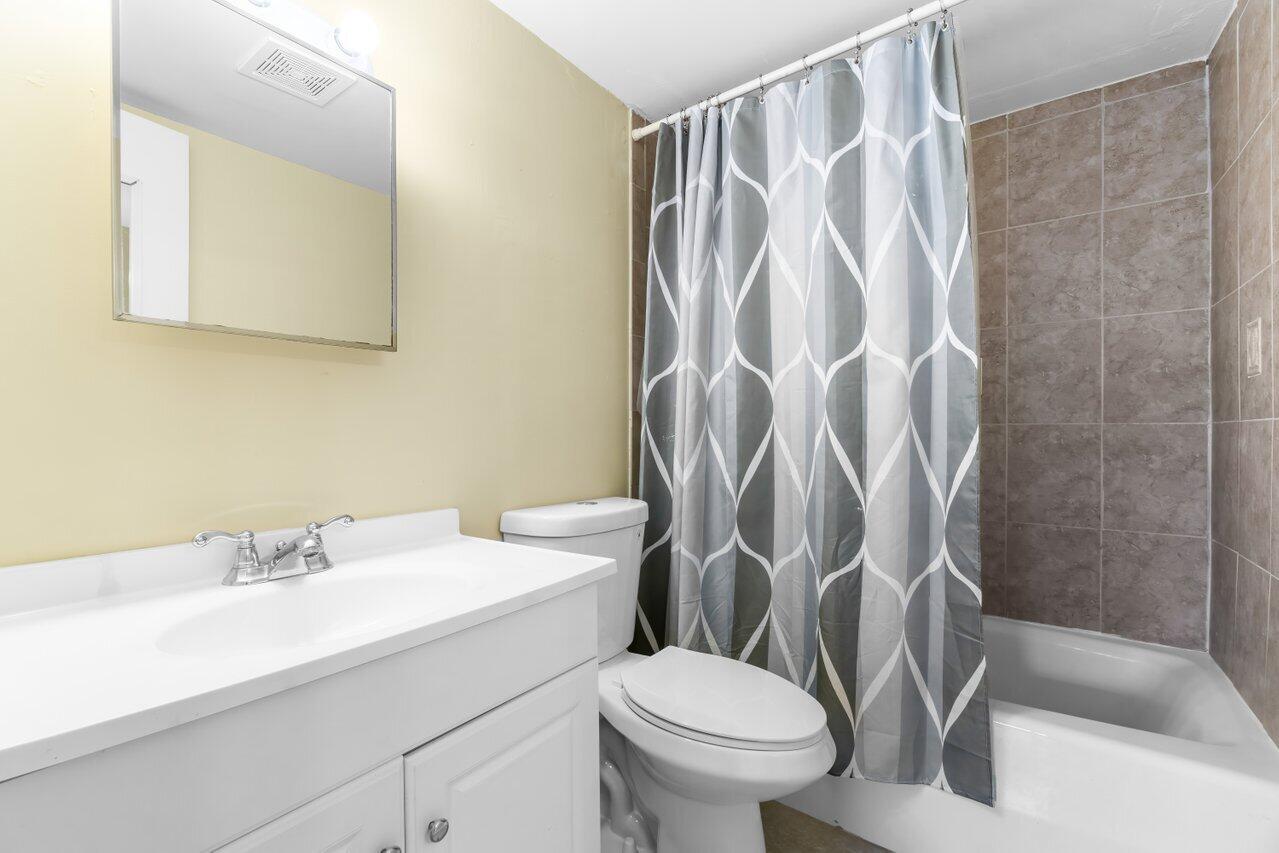 5601 Northwest 2nd Avenue, Unit 217 Boca Raton, FL 33487 - Photo 12 of 42 Primary bathroom